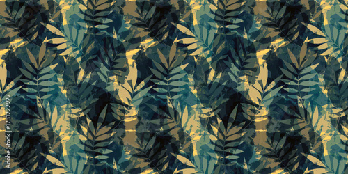 Seamless pattern of abstract leaves in shades of green and yellow gold