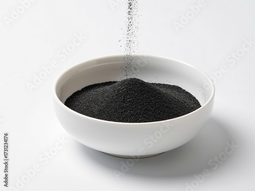 black coffee beans in a cup
