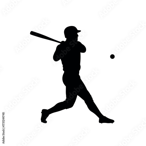Silhouette of a baseball player hitting a ball