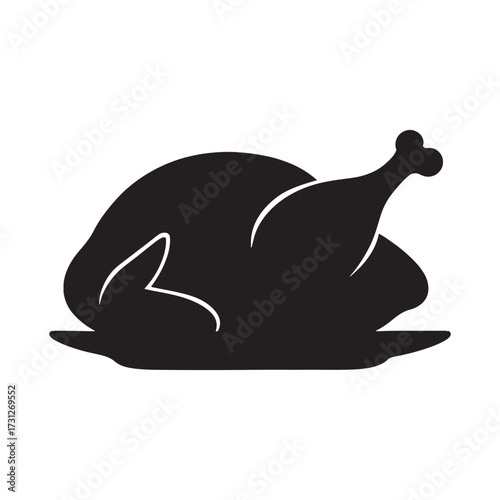 Silhouette of a roasted whole chicken on a serving platter