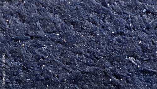 Dark blue, textured mineral surface