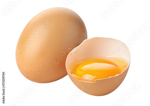 Fresh whole brown eggs and halves with rich yellow yolk isolated on white background texture