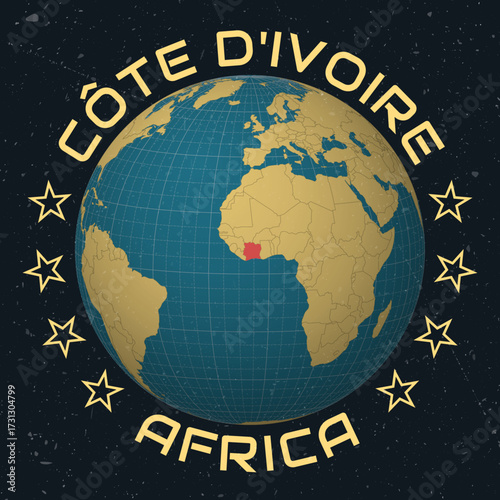 Cote d'Ivoire on Globe. Country name round text. Vintage look with grunge scratched texture. Country view on world map in Sky Blue Light Yellow color palette. Cote d'Ivoire shape on map.