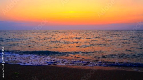 Beautiful summer sunrise over the beach