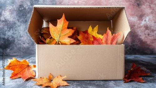Autumn leaves in a cardboard box