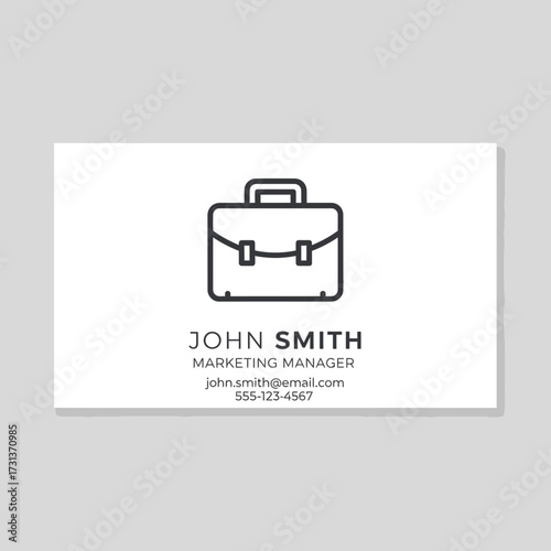 Business card with briefcase icon and contact information.