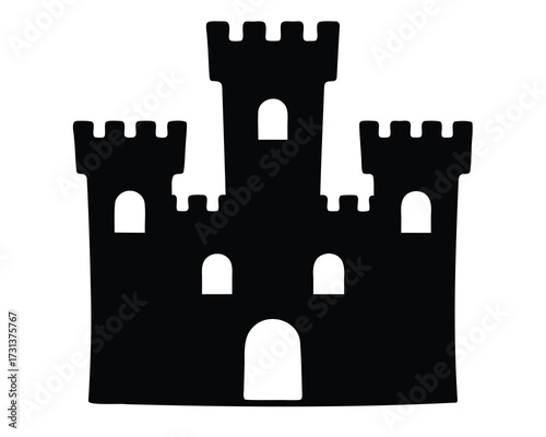 Silhouette of a majestic castle with towers and arched windows and gates