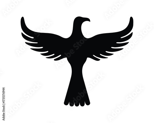 Black Silhouette of a Bird with Wings Spread Wide Open Against White