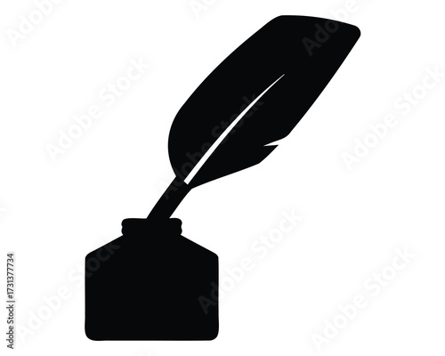 A classic black inkwell and feather quill pen, a timeless symbol