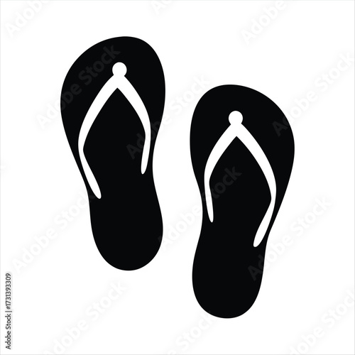 A pair of black and white flip flops isolated on white background