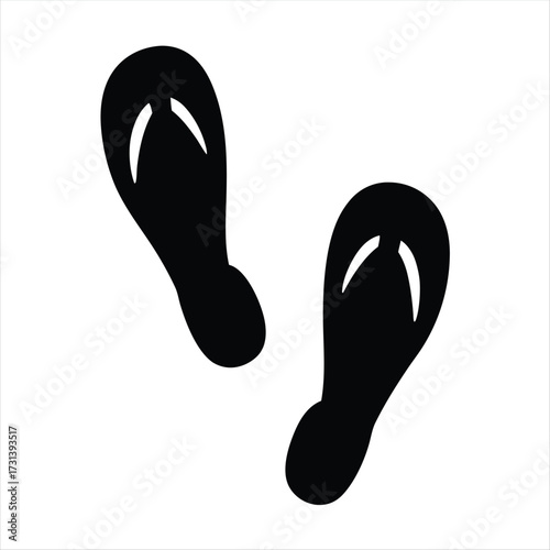 Simple minimalist design of black flip flops on a plain white background