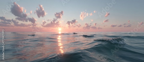 Ocean Horizon At Sunset With Golden Reflections On Gentle Waves under a Cloudy Sky