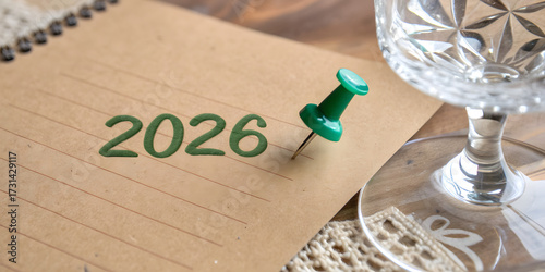 Year 2026 Marked with Green and Red Push Pins on Brown Paper