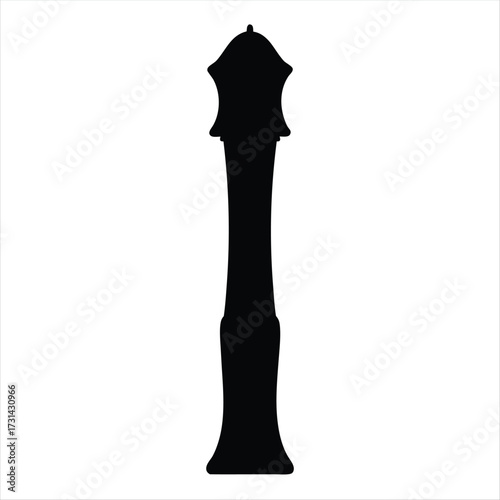 Black silhouette of a tall candlestick or decorative object isolated