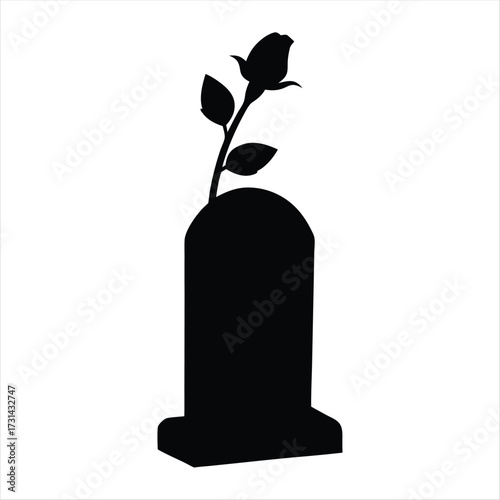 Silhouette of a gravestone with a rose, representing mourning and loss