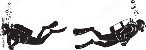 Two scuba divers exploring underwater silhouette