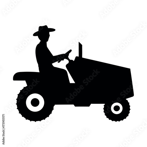 Silhouette of a farmer wearing a hat driving a riding lawn mower