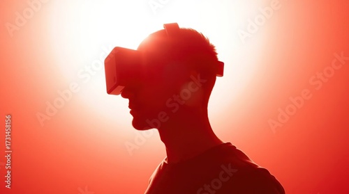 VR headset silhouette with red background.
