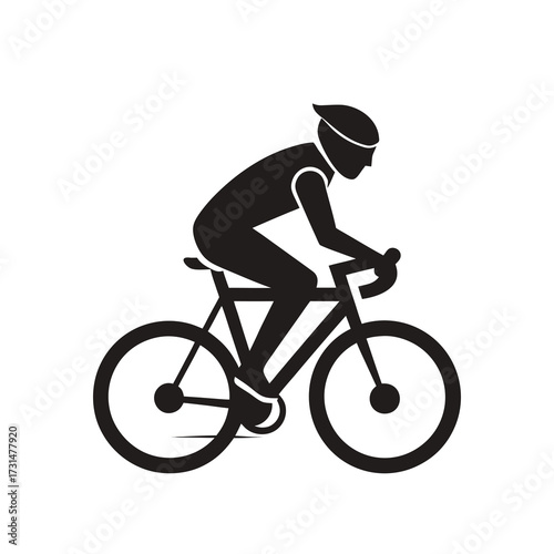 silhouette of a man riding a bicycle