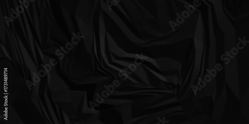 Black paper wrinkled texture for background space. Rough black paper. Paper texture, recycled creased paper background.	