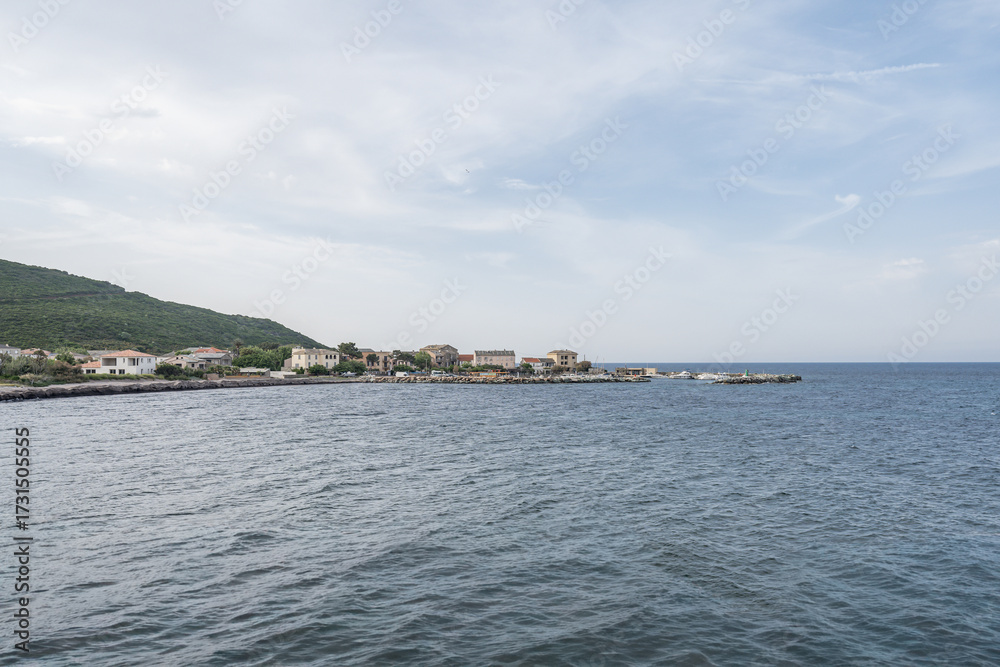 Naklejka premium Village beach view Roadtrip Winding road along rocky coast of Cap Corse peninsula on Corsica island France
