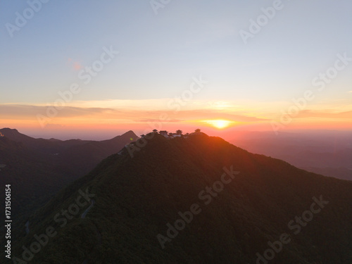 Dahong Mountain China vista shows sunset glow over a quiet peak.