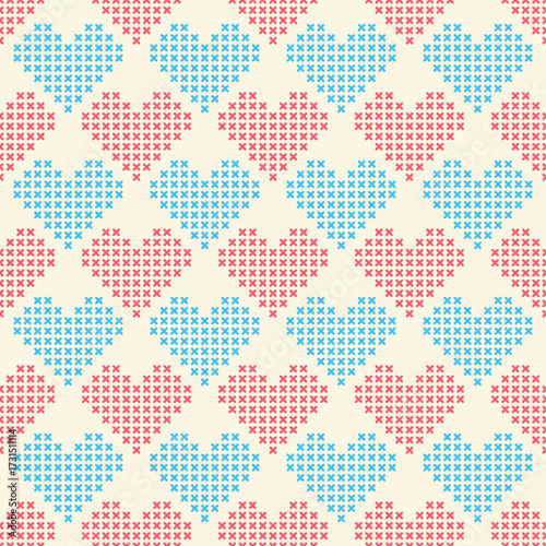 Fotografie Seamless cross-stitch heart pattern creating textile background