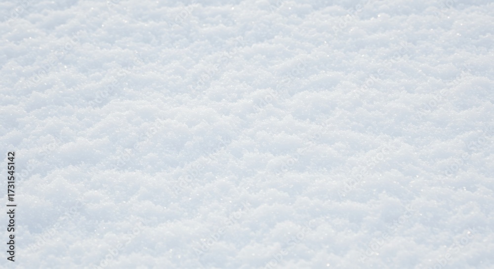 Obraz premium Close-up view of fresh, textured, pristine white snow surface.