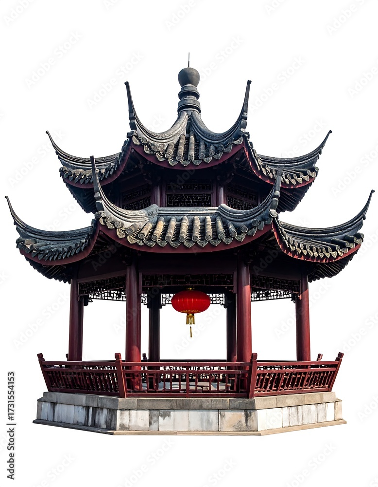 Naklejka premium Ornate three-tiered pagoda with red accents, a lantern hangs within