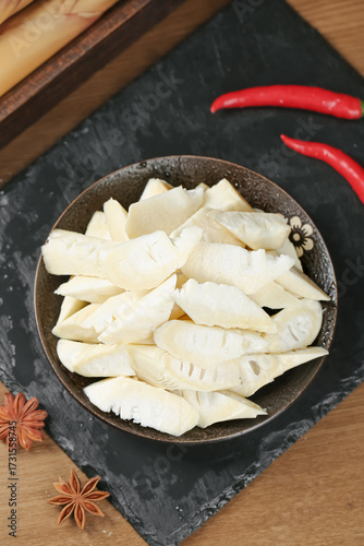 Fresh Bamboo Shoots Sliced in Bowl with Chilies and Star Anise for Asian Sichuan Cooking