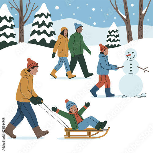 Family enjoying winter activities building a snowman and sledding