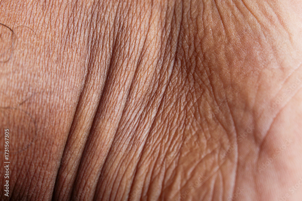 Fototapeta premium Asian man skin texture close up. Man with tan skin