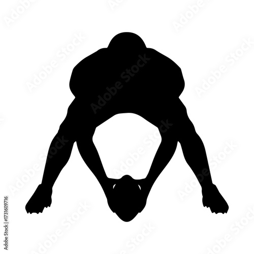 Silhouette of an American football player in low stance ready to snap
