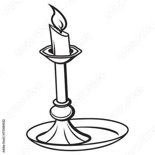 Candle burning in a classic candlestick holder