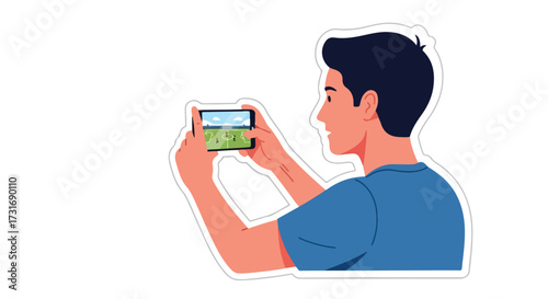 Man capturing a dynamic soccer match on his smartphone, displaying modern technology and passion for the sport, illustrating user-generated content