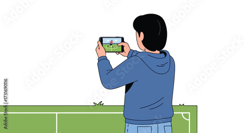 Capturing the Game: Man Recording a Football Match with a Smartphone on the Sidelines observing competition dynamics and field play with focus
