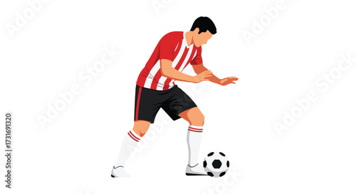 Focused football athlete dribbling the ball on a white background in striped team jersey ready to strike competitive sportsmanship and agility game
