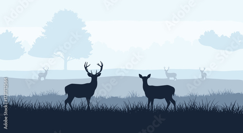 A herd of deer in a misty morning landscape.