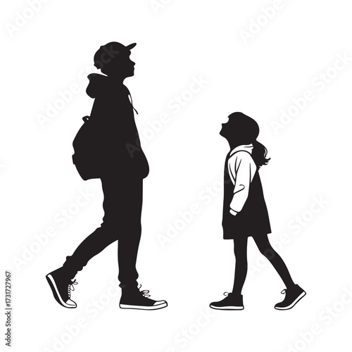 Silhouettes of a teenager and a young child looking up