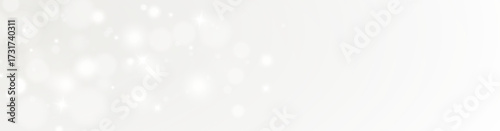 Dazzling festive glow with elegant golden glitter, luminous bokeh lights and sparkling starlight. Abstract holiday background perfect for New Year celebration, cards and illustrations
