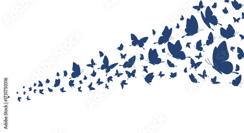 A swarm of dark blue butterflies flying towards the right side of the image.
