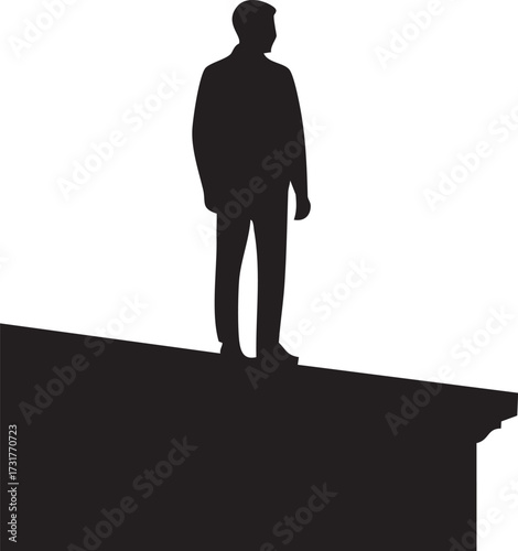 Silhouette of a person standing on rooftop edge