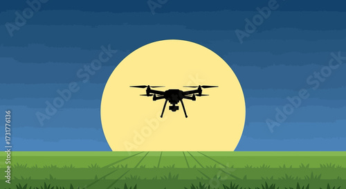 Silhouette of a drone flying in front of a large yellow circle representing the sun or moon.