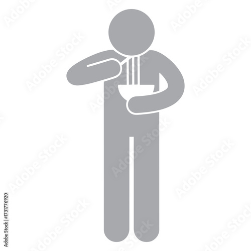 standing and eating noodles