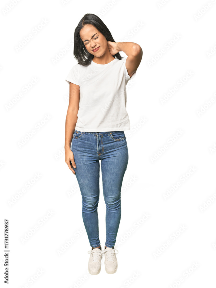 Obraz premium Full body shot of Latina in studio suffering neck pain due to sedentary lifestyle.
