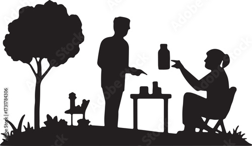 Silhouette of Man and Woman in Garden