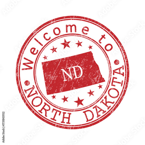 Welcome to North Dakota. A worn stamp with a silhouette of the state and an abbreviated designation. Print impression, a template for creative design