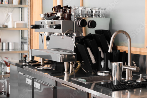 An Innovative Modern Coffee Bar Setup Featuring an Espresso Machine along with Essential Accessories