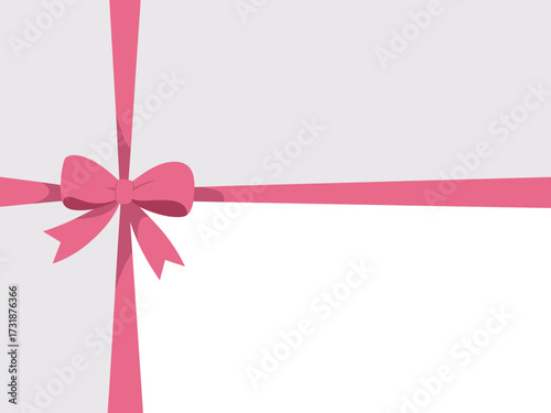 Minimalist pink ribbon bow on subtle gray surface perfect for gift wrapping and celebrations