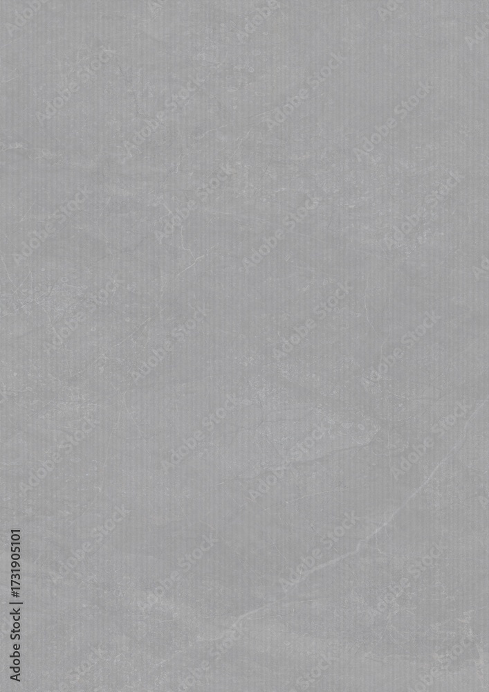 Fototapeta premium Close-up of a smooth, light gray textured surface with subtle variations in tone and faint markings.